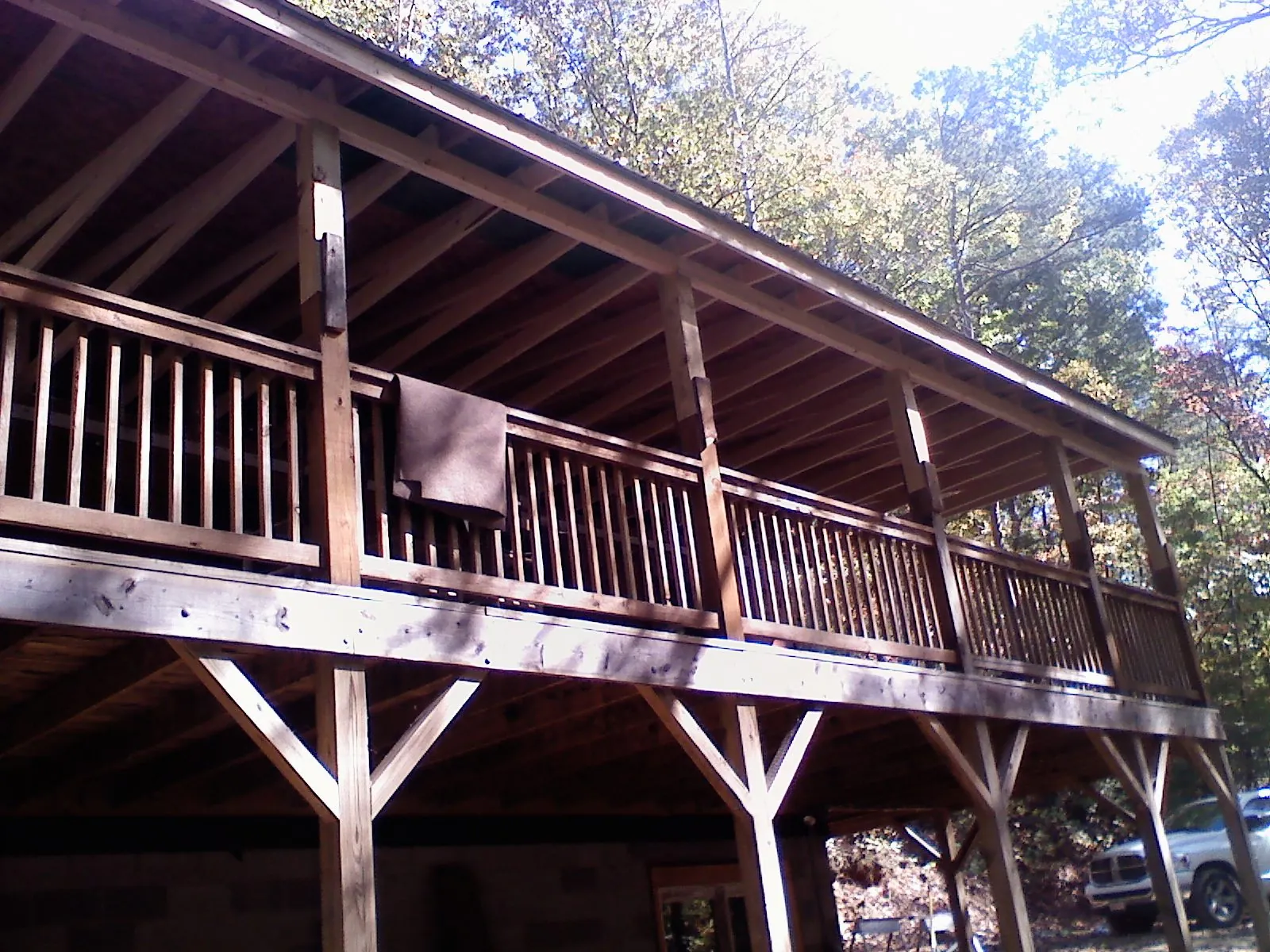 Timber framing under a new elevated porch and deck — Roof Leak Repair in Winnebago by Roofing Brothers